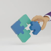 businessman-holding-puzzle-connecting-puzzle-pieces-on-white-background