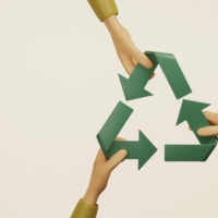 three-hands-help-assemble-recycle-icon-on-cream-background